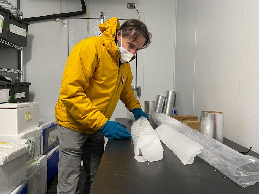 Eric Steig takes out an ice core from Antartica