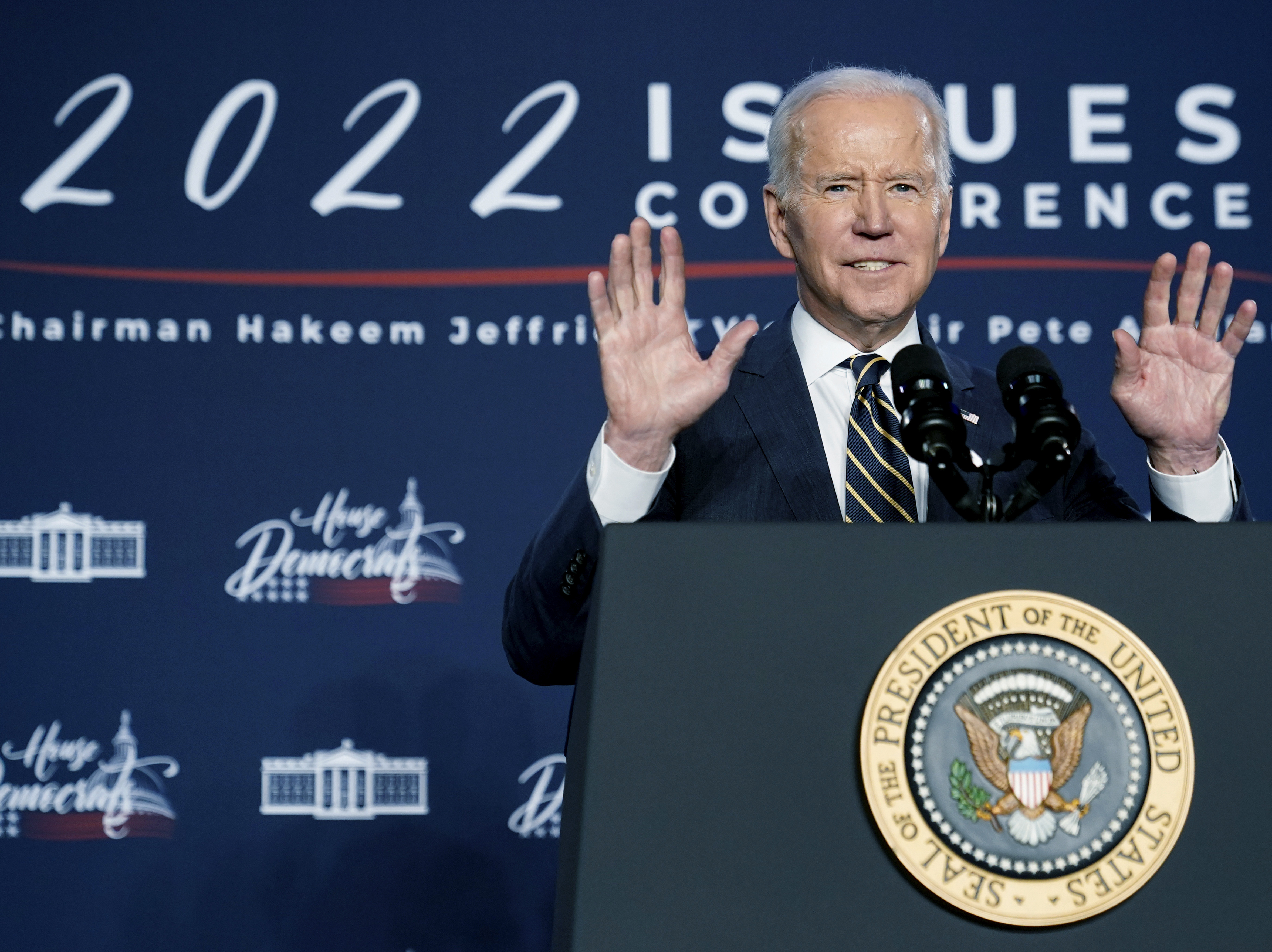 caption: President Biden speaks at the House Democratic Caucus' Issues Conference on March 11 in Philadelphia.