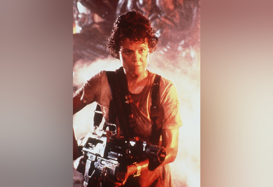 caption: Sigourney Weaver is shown in this 1986 photo from the movie "Aliens".