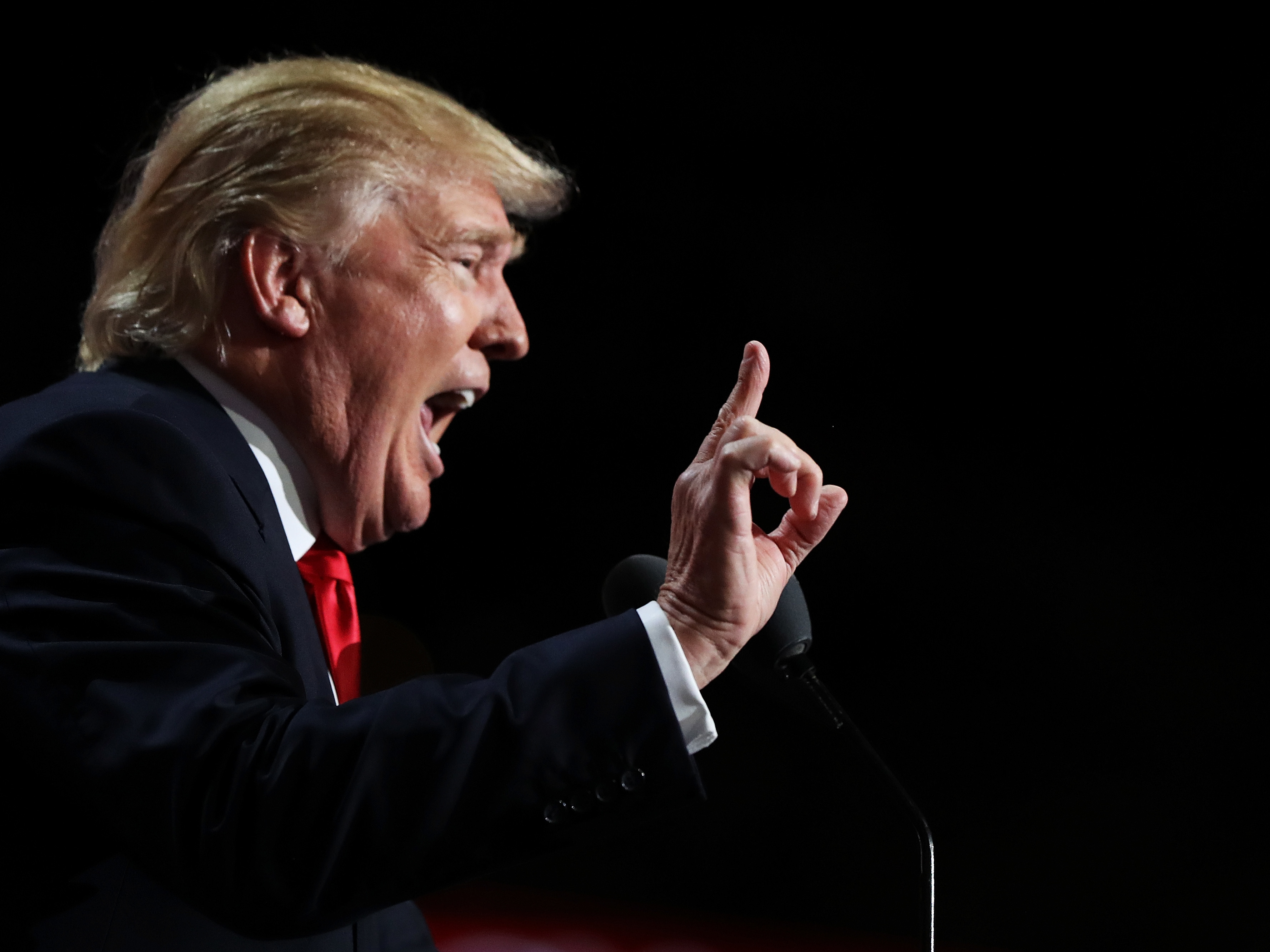 caption: Facebook indefinitely suspended then-President Donald Trump's accounts in January after a mob of his supporters stormed the U.S. Capitol.