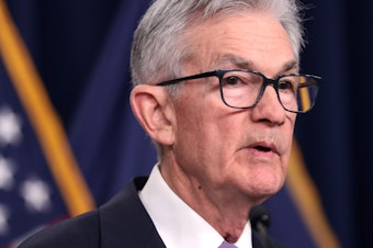 caption: U.S. Federal Reserve Board Chairman Jerome Powell speaks at a news conference at the headquarters of the Federal Reserve on December 13, 2023 in Washington, DC. The Federal Reserve announced today that interest rates will remain unchanged.