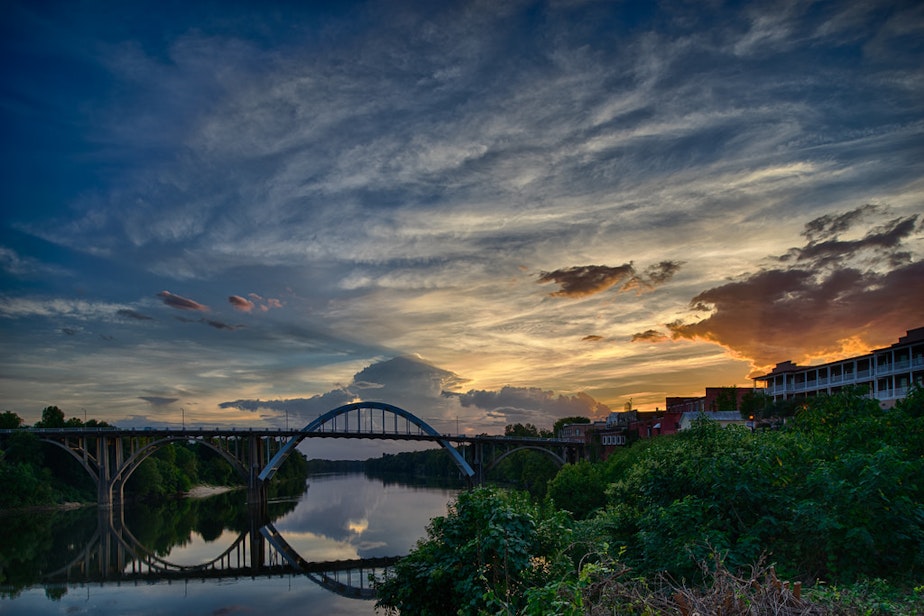 caption: Sunset over the Alabama River and the Edmund Pettus Bridge in Selma.