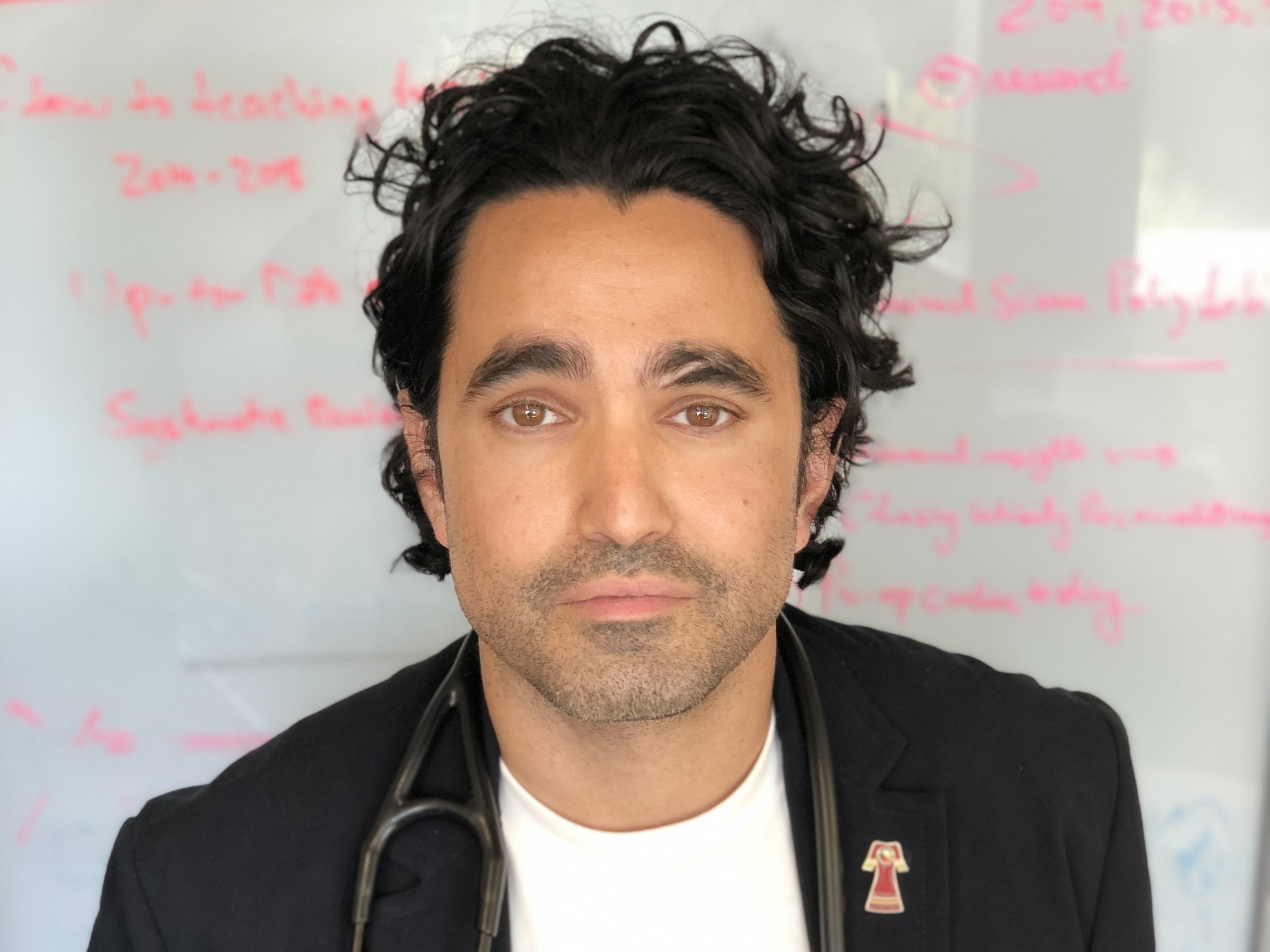 caption: Dr. Andrew Boozary