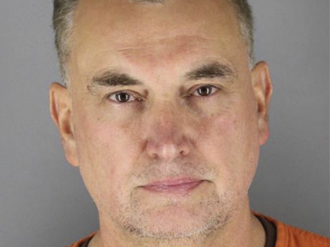 caption: This booking photo provided by the Hennepin County Sheriff's Office shows Vance Boelter in Green Isle, Minn., early Monday morning — shortly after a two-day manhunt ended in his capture and arrest.