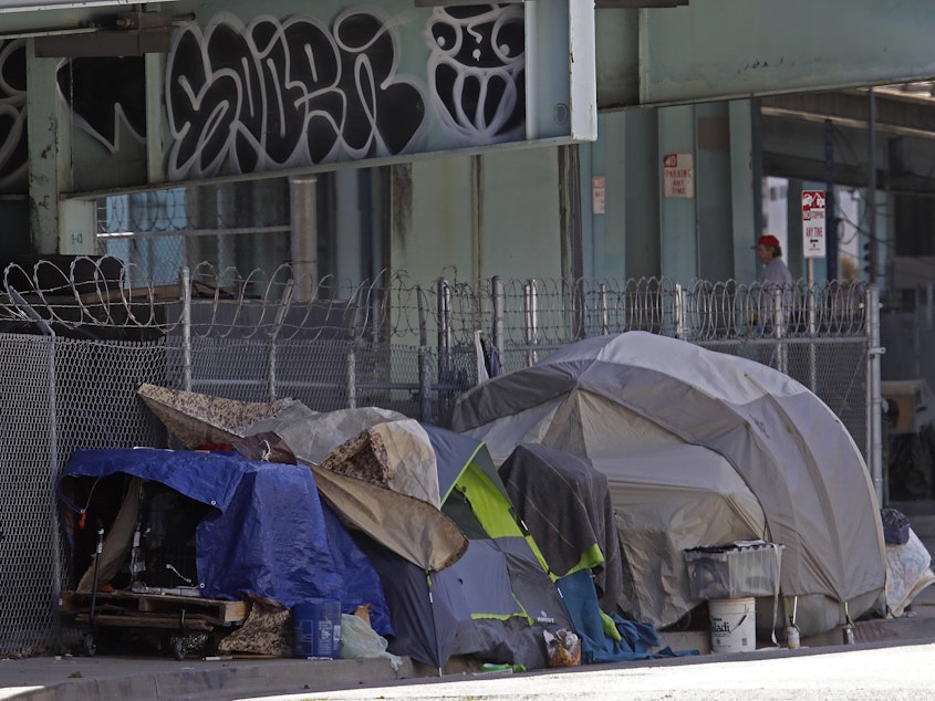 caption: A homeless encampment seen on Monday in San Francisco. City lawmakers are demanding that the mayor step up efforts to house the city's homeless population to protect them from COVID-19.