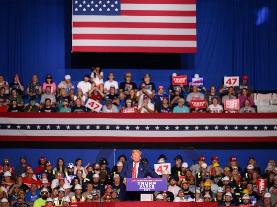 caption: Former President Donald Trump speaks at a campaign rally on Friday in Johnstown, Pa. 