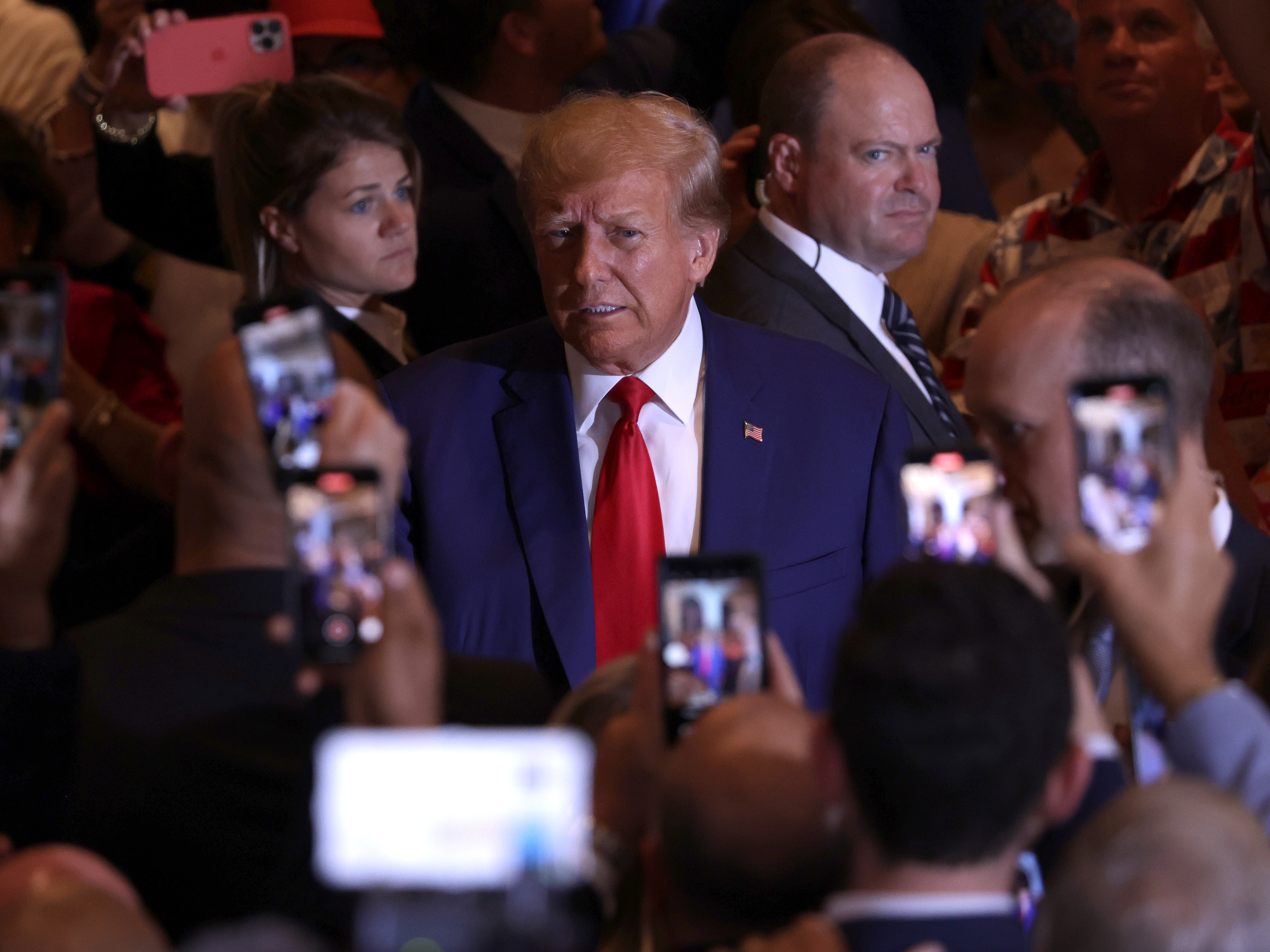 caption: Former U.S. President Donald Trump arrives at an event Mar-a-Lago in West Palm Beach, Florida on Tuesday after pleading not guilty to 34 felony counts.