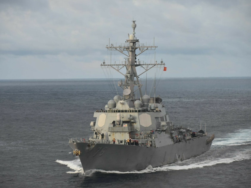 caption: The guided-missile destroyer USS Higgins (DDG 76) is pictured in the South China Sea on July 28, 2022.