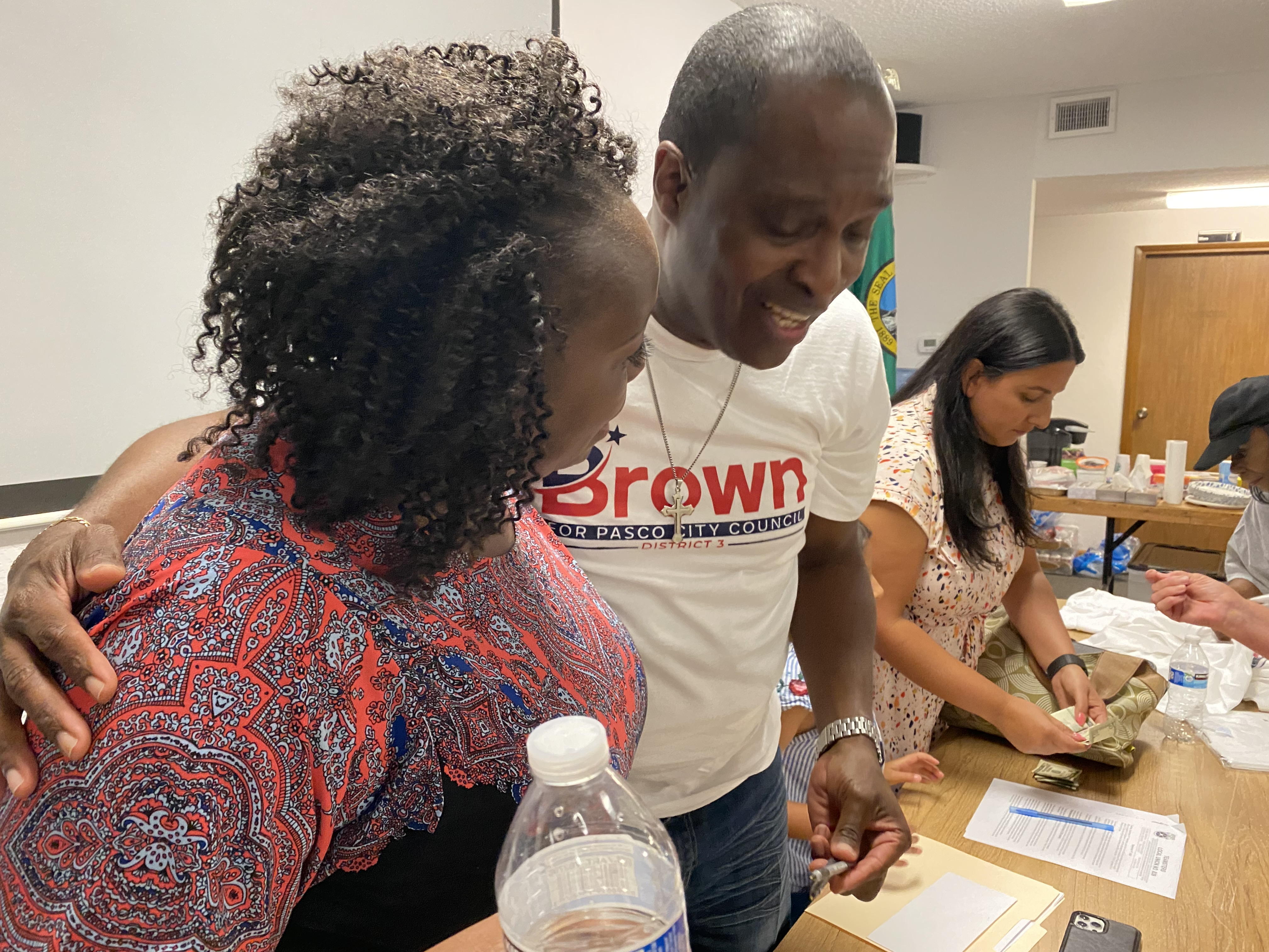caption:  Incumbent Pasco City Councilmember Irving Brown has been targeted by racist letters, a knocked down campaign sign and vandalism in his yard. His supporters held a rally in Pasco on Tuesday evening.
