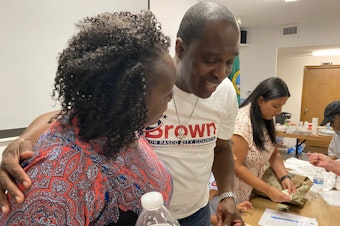caption:  Incumbent Pasco City Councilmember Irving Brown has been targeted by racist letters, a knocked down campaign sign and vandalism in his yard. His supporters held a rally in Pasco on Tuesday evening.