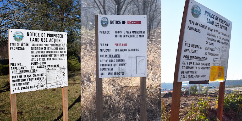 caption: Notices of proposed land use action have sprung up all over Black Diamond, WA. As the town has fought over the planned development, some of the signs have begun to gather moss.