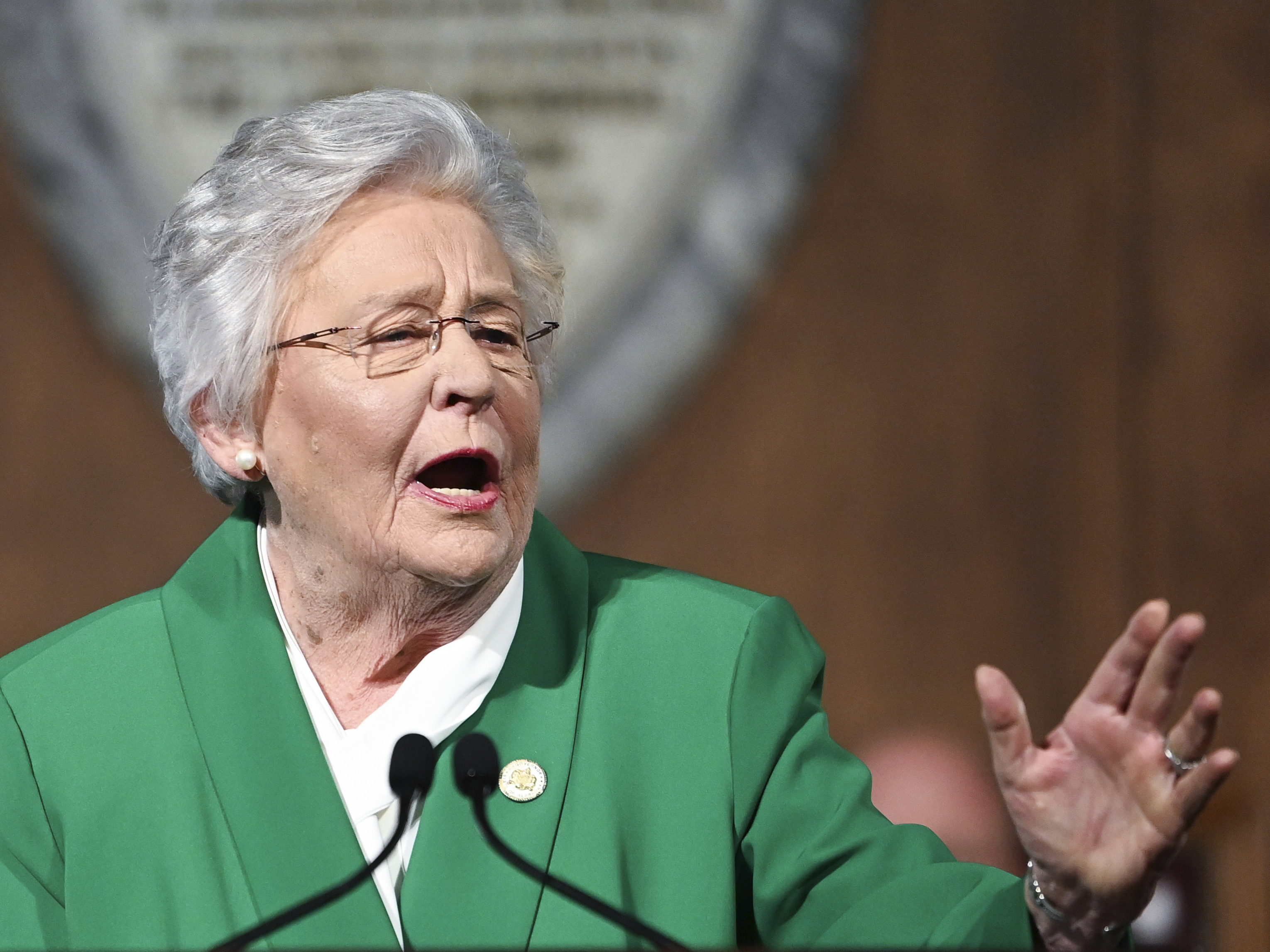 caption: Alabama Gov. Kay Ivey delivers her State of the State address on March 7. On Friday, the governor announced she had replaced her director of early childhood education over the use of a teacher training book.