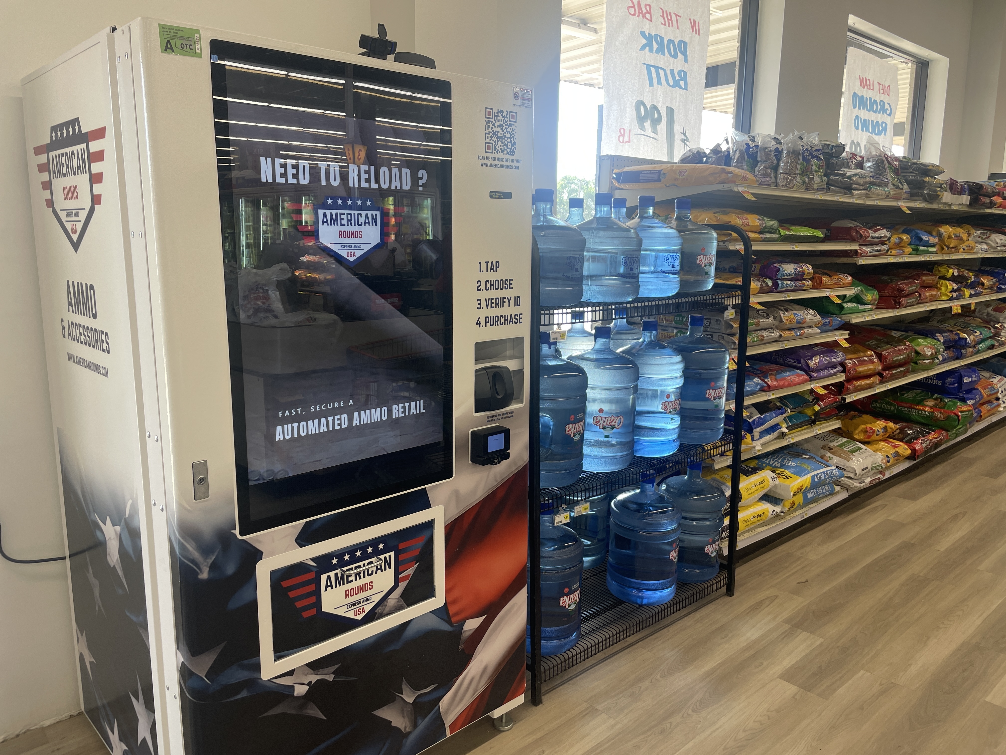 caption: An ammunition vending machine pictured inside a Super C-Mart grocery store in Noble, Okla.
