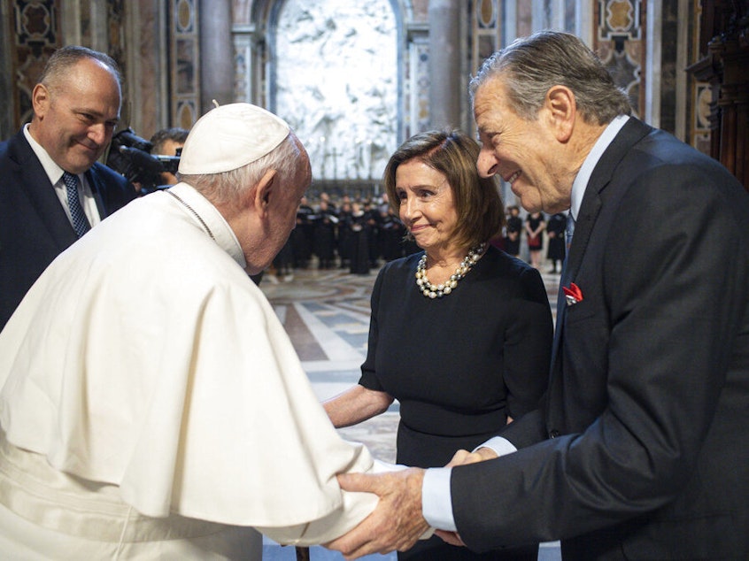 caption: Pope Francis greets Speaker of the House Nancy Pelosi, D-Calif., and her husband, Paul, on Wednesday before celebrating a Mass on the Solemnity of Saints Peter and Paul in St. Peter's Basilica at the Vatican. Pelosi received Communion during the papal Mass, witnesses said, despite her position in support of abortion rights.