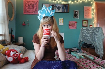 caption: Seattle bedroom pop musician Robin Edwards, who performs under the name Lisa Prank, called out Tesla creator Elon Musk on Twitter Tuesday for using her dad's art without permission.
