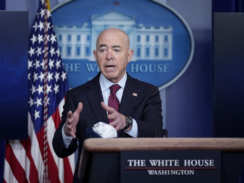 caption: Homeland Security Secretary Alejandro Mayorkas told reporters that reuniting families was a "moral imperative" for the Biden administration.