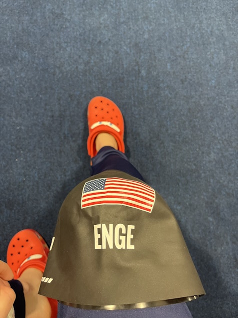 caption: Enge shows off her "lucky" Lightning McQueen Crocs, from the Pixar movie, "Cars."