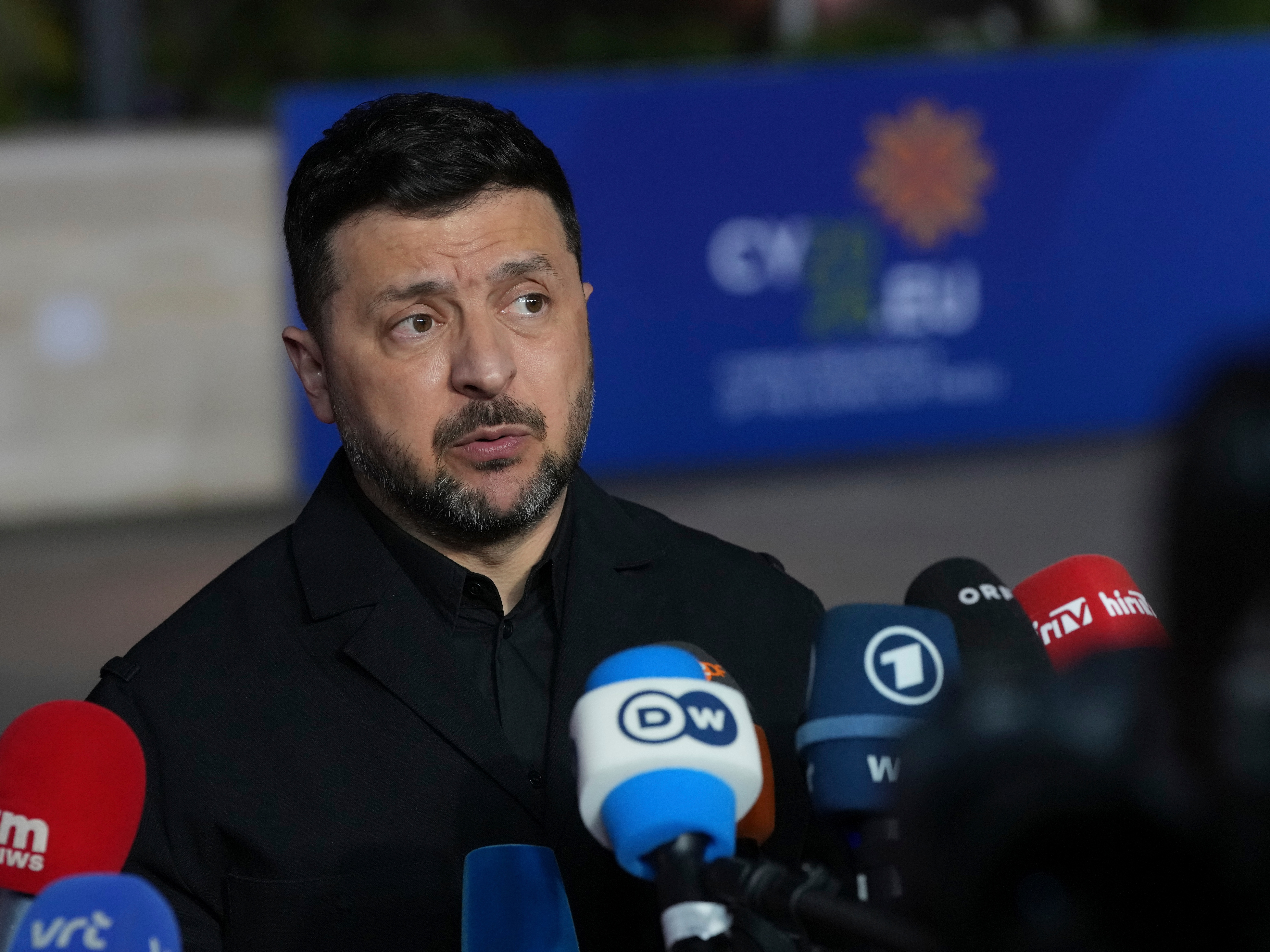 caption: Ukraine's President Volodymyr Zelenskyy makes statements as he arrives for the EU Summit in Ayia Napa, Cyprus, Thursday, April 23, 2026.