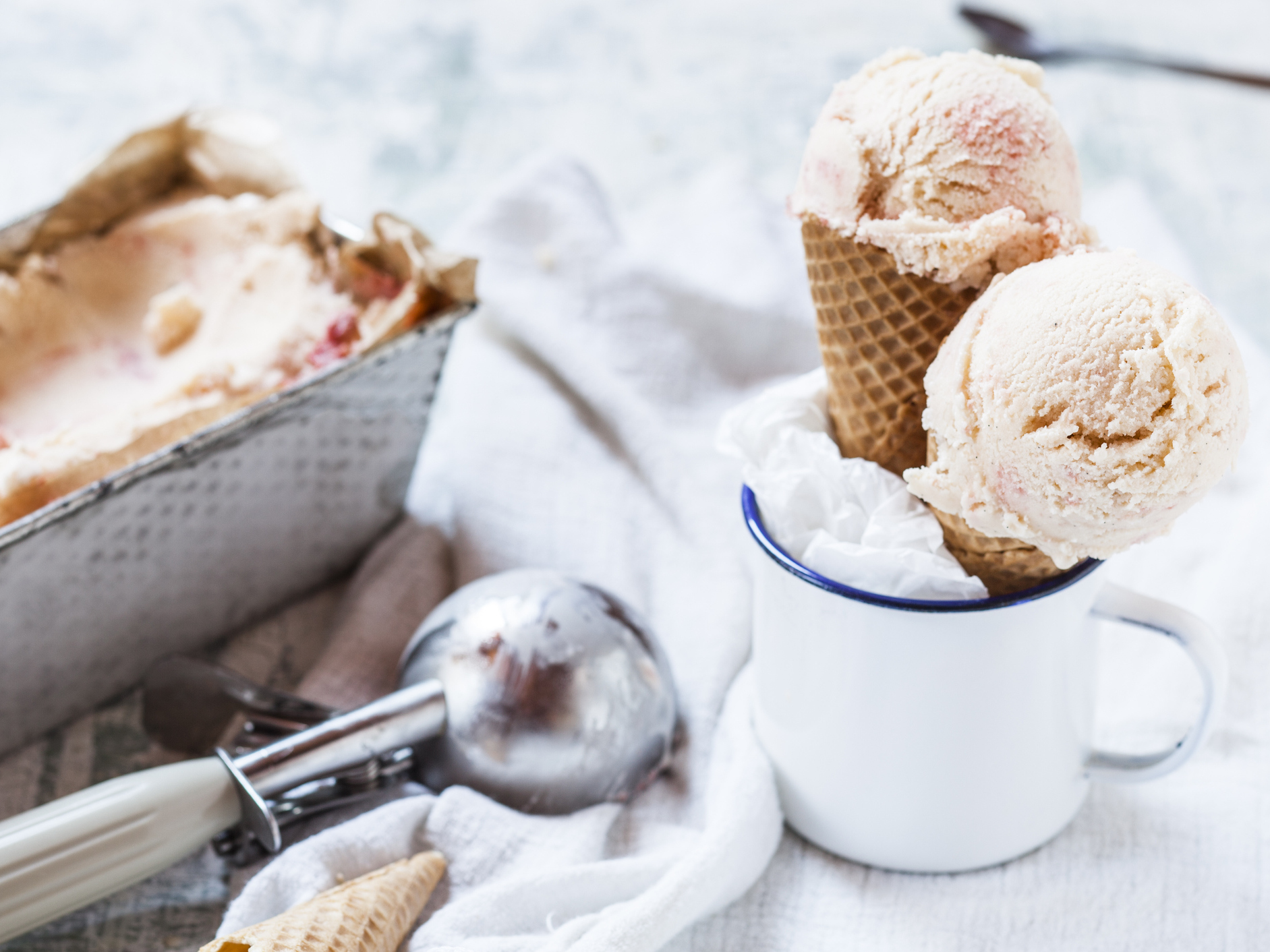 caption: The average American eats more than 22 pounds of ice cream an frozen treats a year.