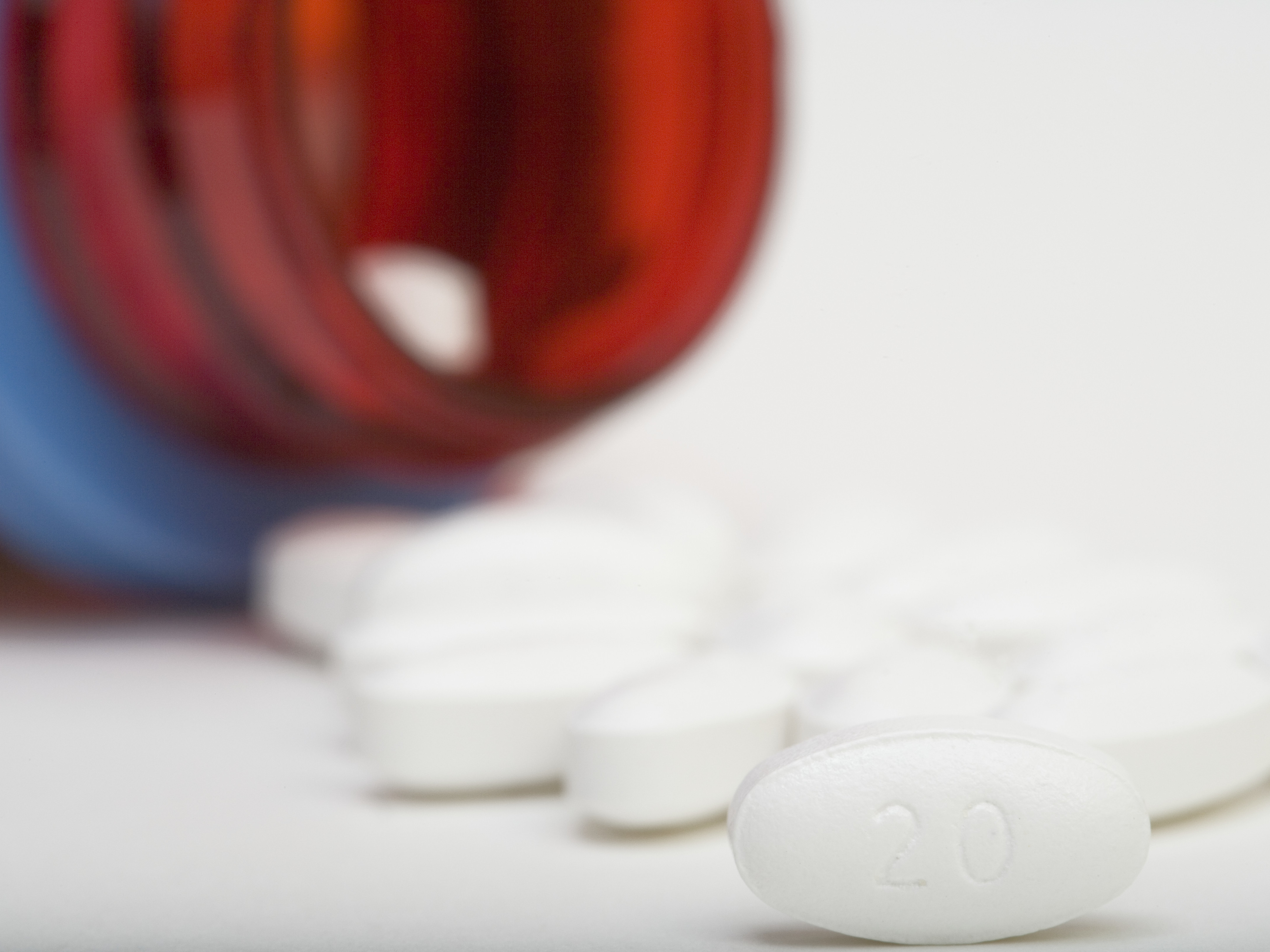 caption: Atorvastatin, the generic form of Lipitor, can reduce the chances of heart attacks and strokes in people at risk. Side effects, such as muscle pain, are uncommon but should be part of the conversation about starting the medicines, a study concludes.