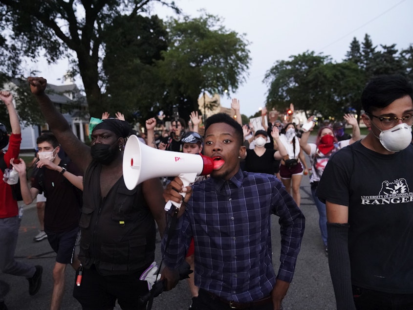 caption: Protesters march on Wednesday against the Sunday police shooting of Jacob Blake in Kenosha, Wis., over the weekend.