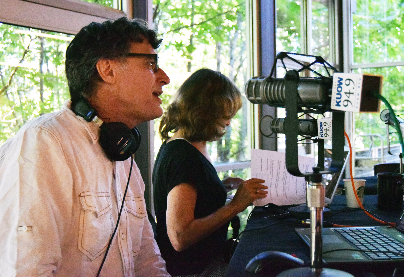 caption: Bill Radke and Joni Balter prep for a live broadcast of Week In Review at the Northgate Community Center on Friday, June 26, 2015.
