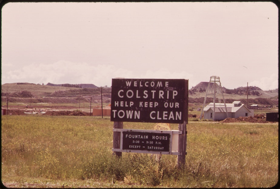 caption: Strip-mining spoil piles in background in Colstrip, Montana, June 1973.