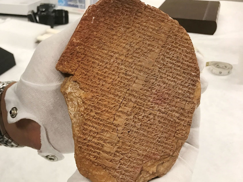 caption: Hobby Lobby bought the Gilgamesh Dream Tablet for $1.67 million in 2014. Now it's being returned to Iraq.