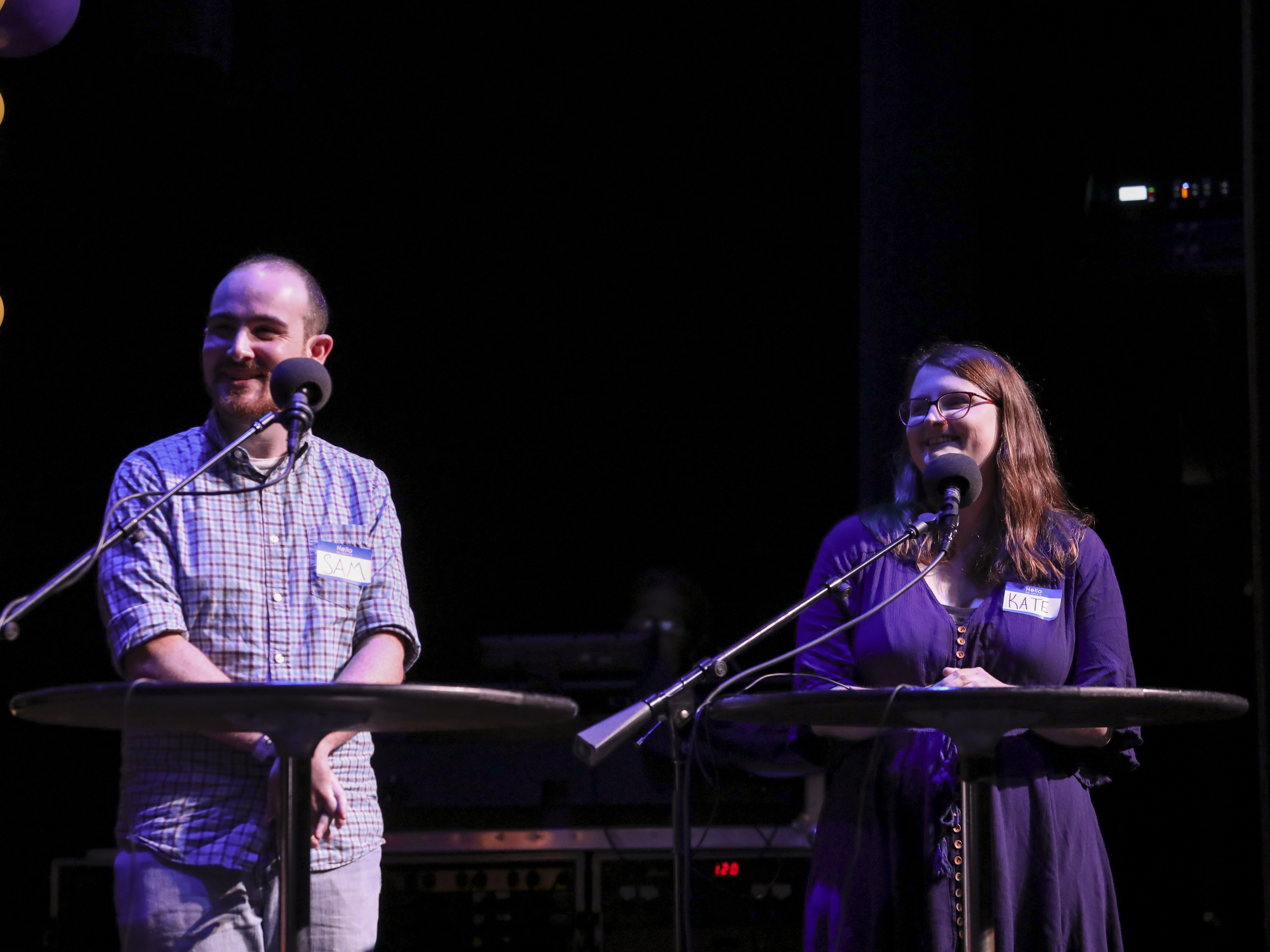 caption: Contestants Sam Cappoli and Kate Morics appear on <em>Ask Me Another </em>at the Lobero Theatre in Santa Barbara, California.