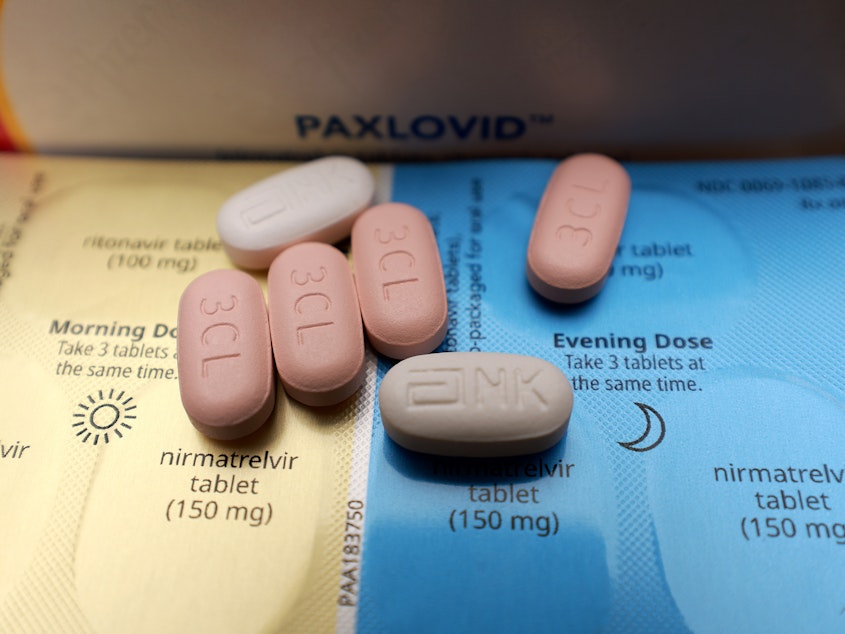 caption: Pfizer's Paxlovid combines two antiviral drugs to fight the virus that causes COVID-19.
