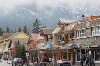 caption: A Kentucky man faces stiff consequences after being charged with breaking Canada's Quarantine Act in Banff, Alberta, in June. The town of Banff is seen here in April 2017.