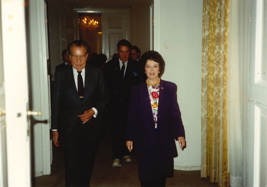 caption: Former President Richard Nixon walks with Shirley Temple during a visit to Prague, where Temple was U.S. ambassador to Czechoslovakia. “He never visited or went to any of the embassies but when he went to this country, he got a call from her saying ‘I want you to come by,’” Endicott said. “When she was 7 or 8 years old she was the star in movies. She was extremely talented, sang and danced and just won America’s heart. How can you say no to Shirley Temple?”