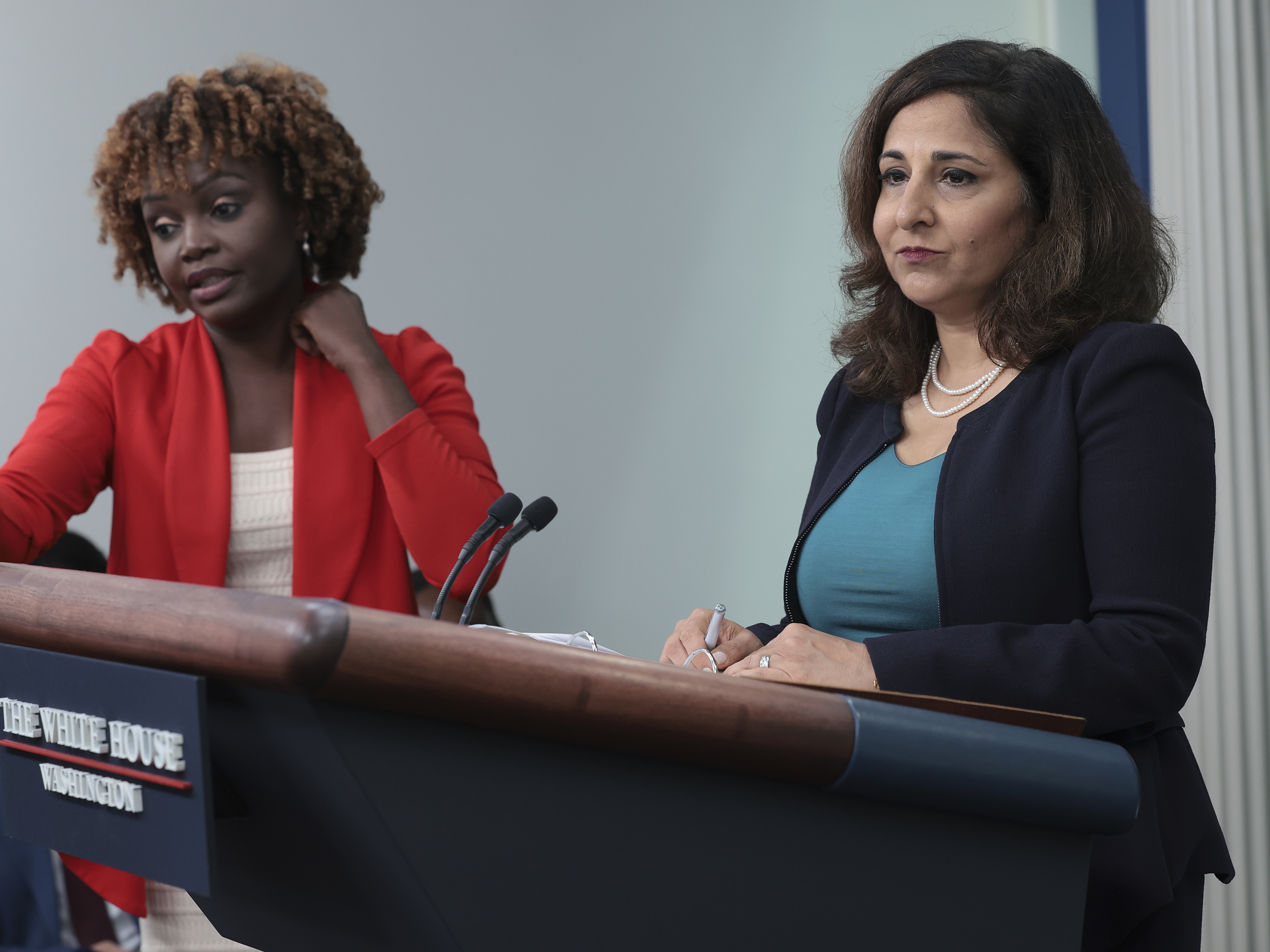 caption: White House press secretary Karine Jean-Pierre, left, and Domestic Policy Adviser Neera Tanden, right, answer questions during a daily press briefing at the White House in August. Tanden is accused of violating the Hatch Act, in a complaint by the U.S. Office of Special Counsel.
