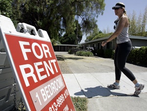 caption: A for rent sign in Palo Alto, California. Across the country rents are on the rise, in part due to a historic shortage of homes either to rent or buy.