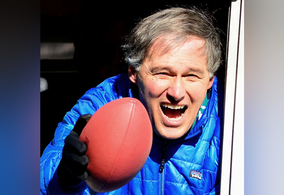caption: Gov. Jay Inslee at the Seahawks' Super Bowl parade in 2014.