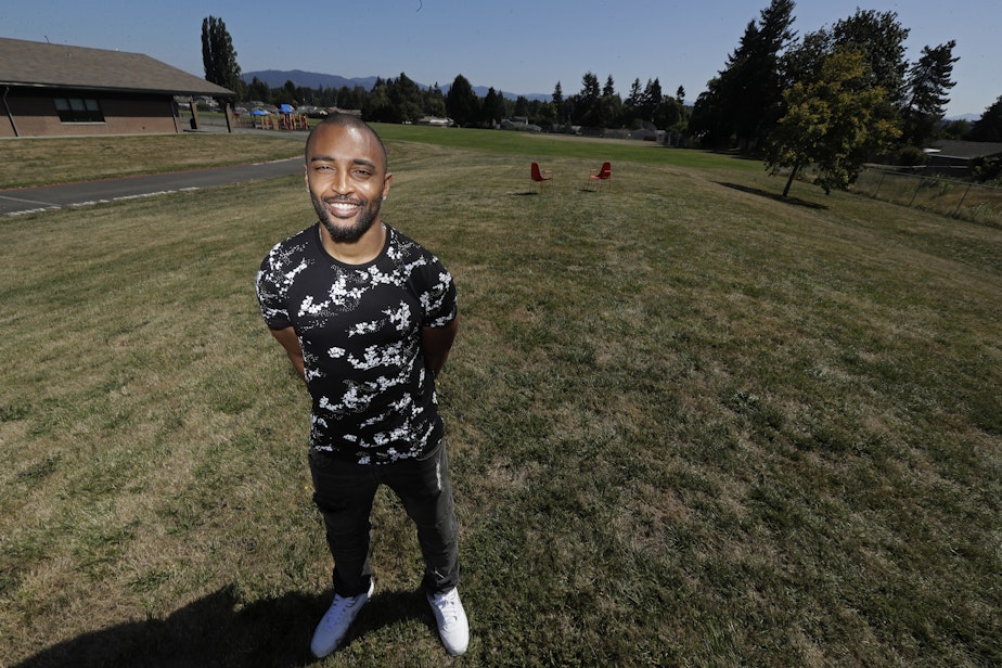 caption: Former NFL football Seattle Seahawks wide receiver Doug Baldwin at the location in Renton where he hopes to spearhead the construction of a community center. Baldwin is donating $1 million toward the project with the goal of raising another $5 million. Aug. 26, 2019.