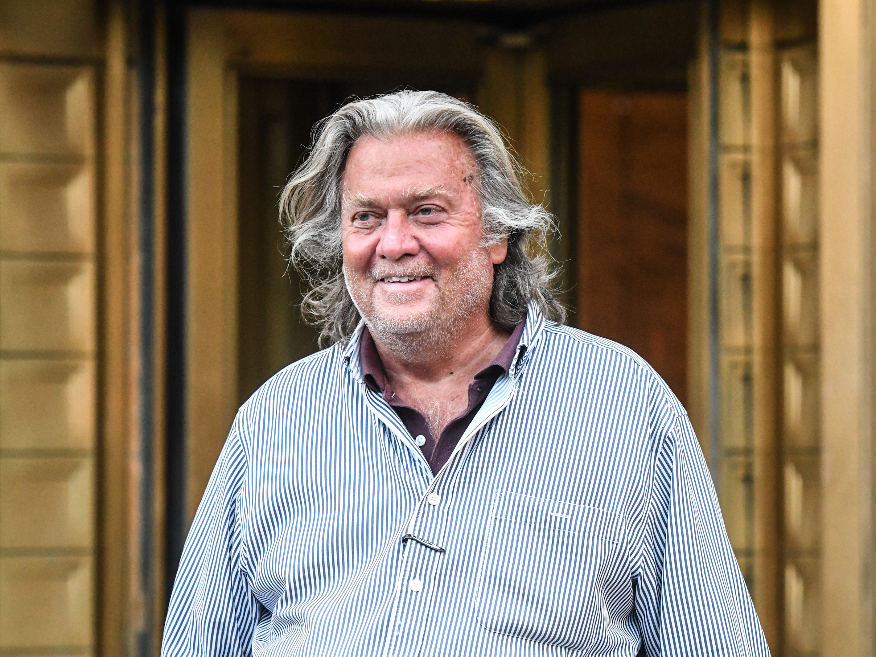 caption: Former White House chief strategist Steve Bannon has been penalized by Facebook and YouTube, and suspended from Twitter, for his activity on social media.