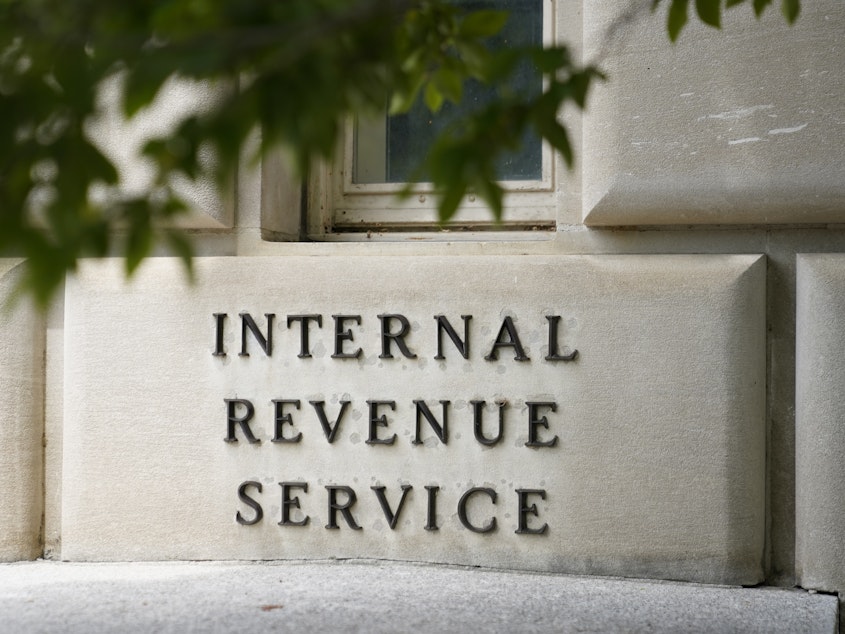 caption: A sign outside the Internal Revenue Service building is seen, May 4, 2021, in Washington. The amount of tax money owed but not paid to the IRS is set to keep growing, according to projections published by the federal tax collection agency.