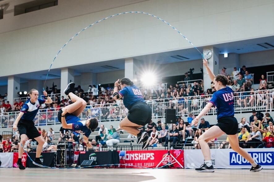 caption: Madeleine Garrison, Halle Morgan, Calla Freeman, and Alia Lundburg do Double Dutch freestyle as part of the International Jump Rope Union's World Championships in Japan in August 2025.