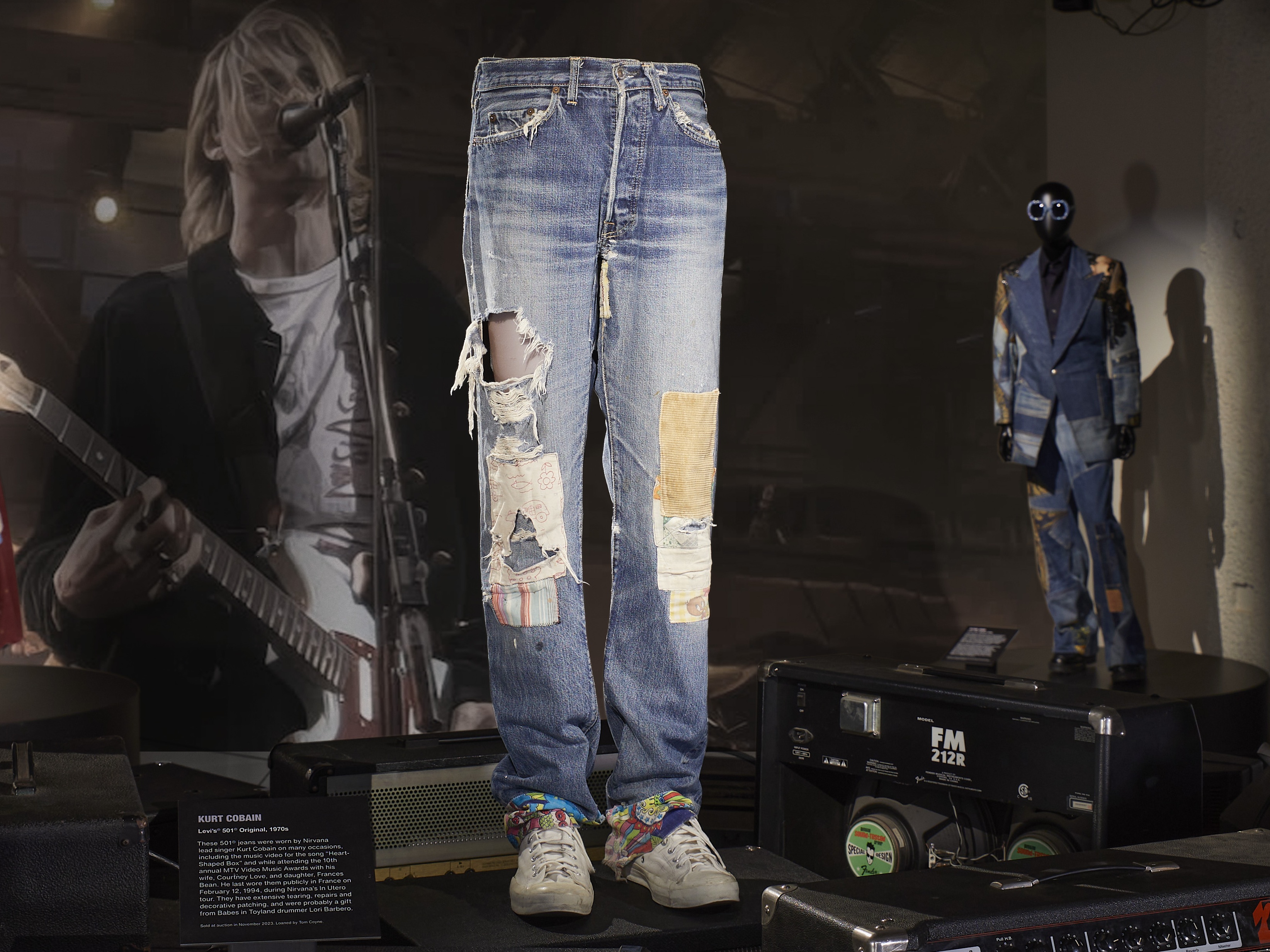 caption: Levi's 501 jeans worn by Nirvana lead singer Kurt Cobain, including in the music video for the song "Heart-Shaped Box." They were sold at auction in November 2023 to a private collector.