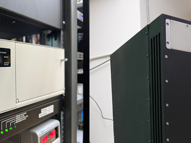 caption: Cesium beam clocks (left) and hydrogen masers are among the types of atomic clocks used by the National Institute of Standards and Technology (NIST) to determine official U.S. time.