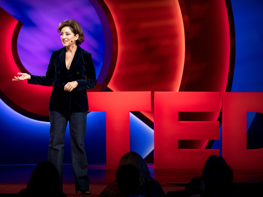 caption: Valorie Kondos Field speaks on the TED stage