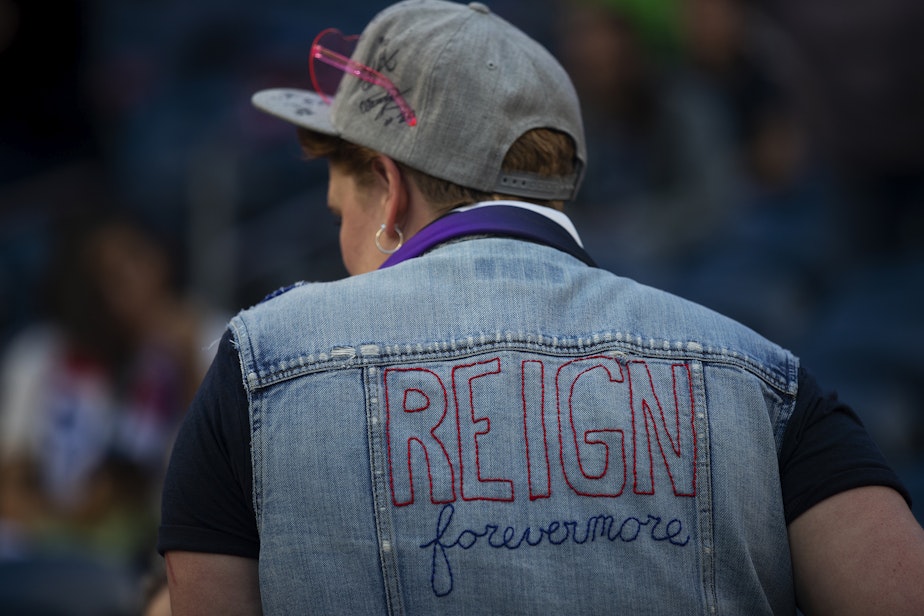 caption: Cydney McFarland attends OL Reign forward Megan Rapinoe’s last regular-season home game against the Washington Spirit on Friday, Oct. 6, 2023, at Lumen Field in Seattle. McFarland is the volunteer leader of the Royal Guard, the Reign's official supporter's group. Ahead of the team's 2024 season, they told KUOW that they're excited for a new era for the Reign following Rapinoe's departure. 
