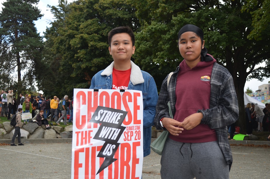 caption: An Nguyen and friend Andrea Hitti-Magee joined the student strike at Cal Anderson park in Seattle. 