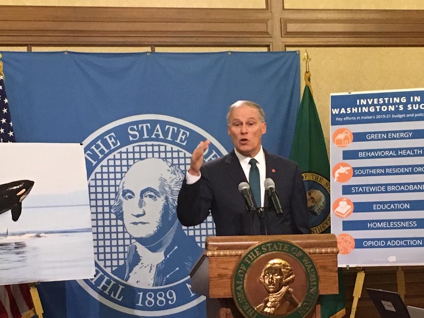 caption: In this file photo, Gov. Jay Inslee addresses reporters at a news conference. On Tuesday, the Democrat blasted a group of House Republicans who filed a lawsuit challenging the constitutionality of his emergency proclmations.