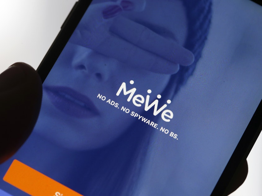 caption: The social network MeWe is among a number of apps seeing an influx of users after Facebook and Twitter kicked off Donald Trump.