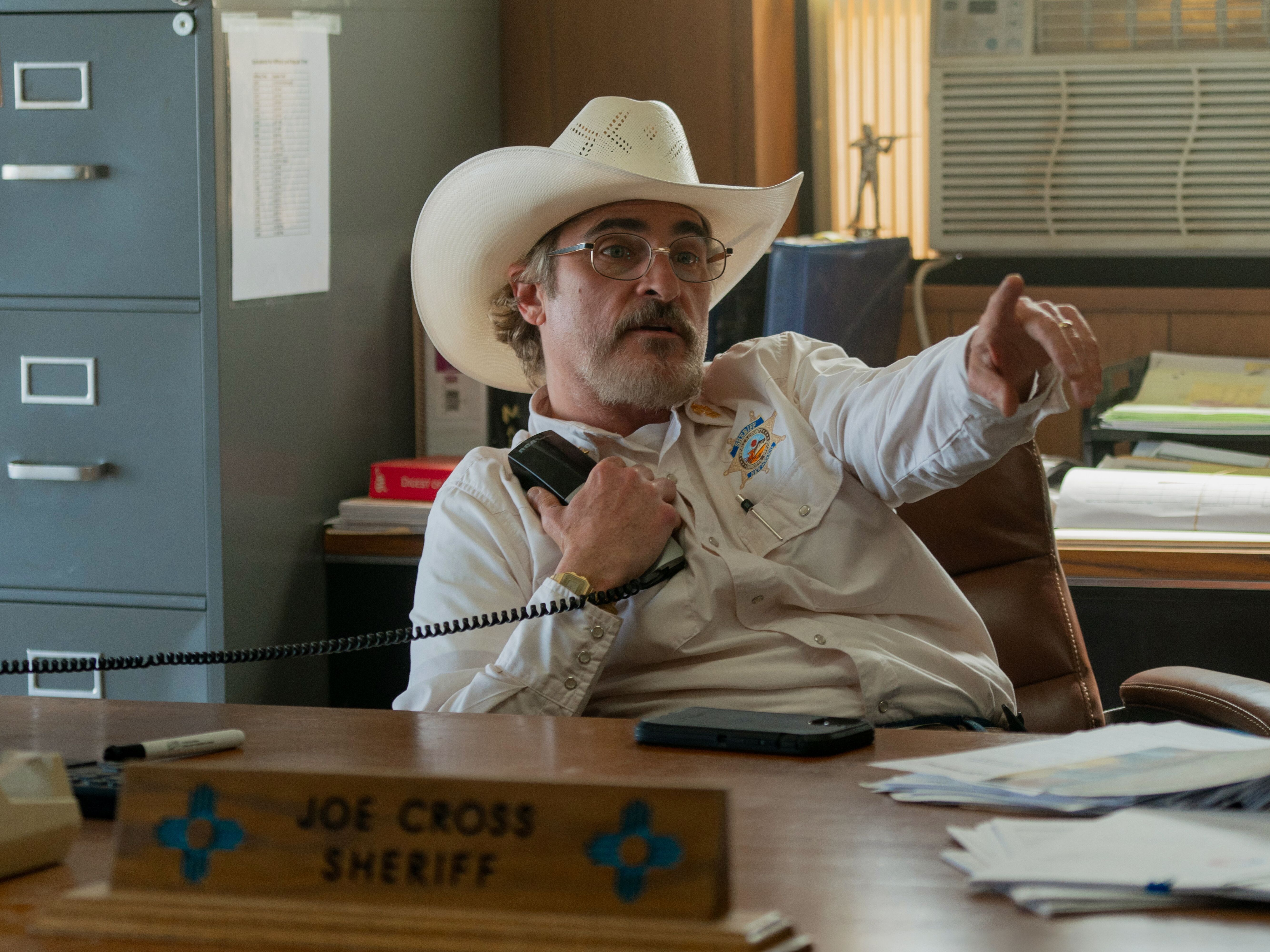 caption: Joaquin Phoenix plays the sheriff of a small New Mexico town in <em>Eddington</em>.