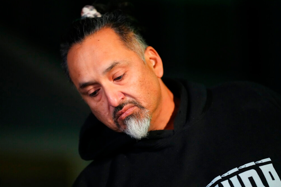 caption: Richard Fierro talks during a news conference outside his home about his efforts to subdue the gunman in Saturday's fatal shooting at Club Q, Monday, Nov. 21, 2022, in Colorado Springs, Colo.