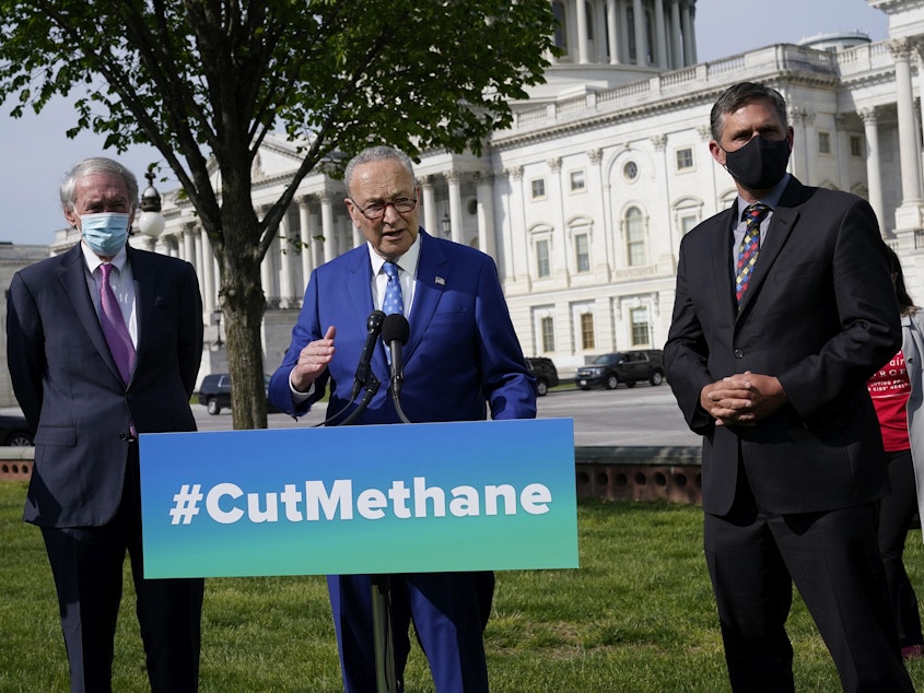 caption: Senate Majority Leader Chuck Schumer, D-N.Y., joined by Sen. Ed Markey, D-Mass., left, and Sen. Martin Heinrich, D-N.M., talks about legislation to re-impose critical regulations to reduce methane pollution from oil and gas wells.