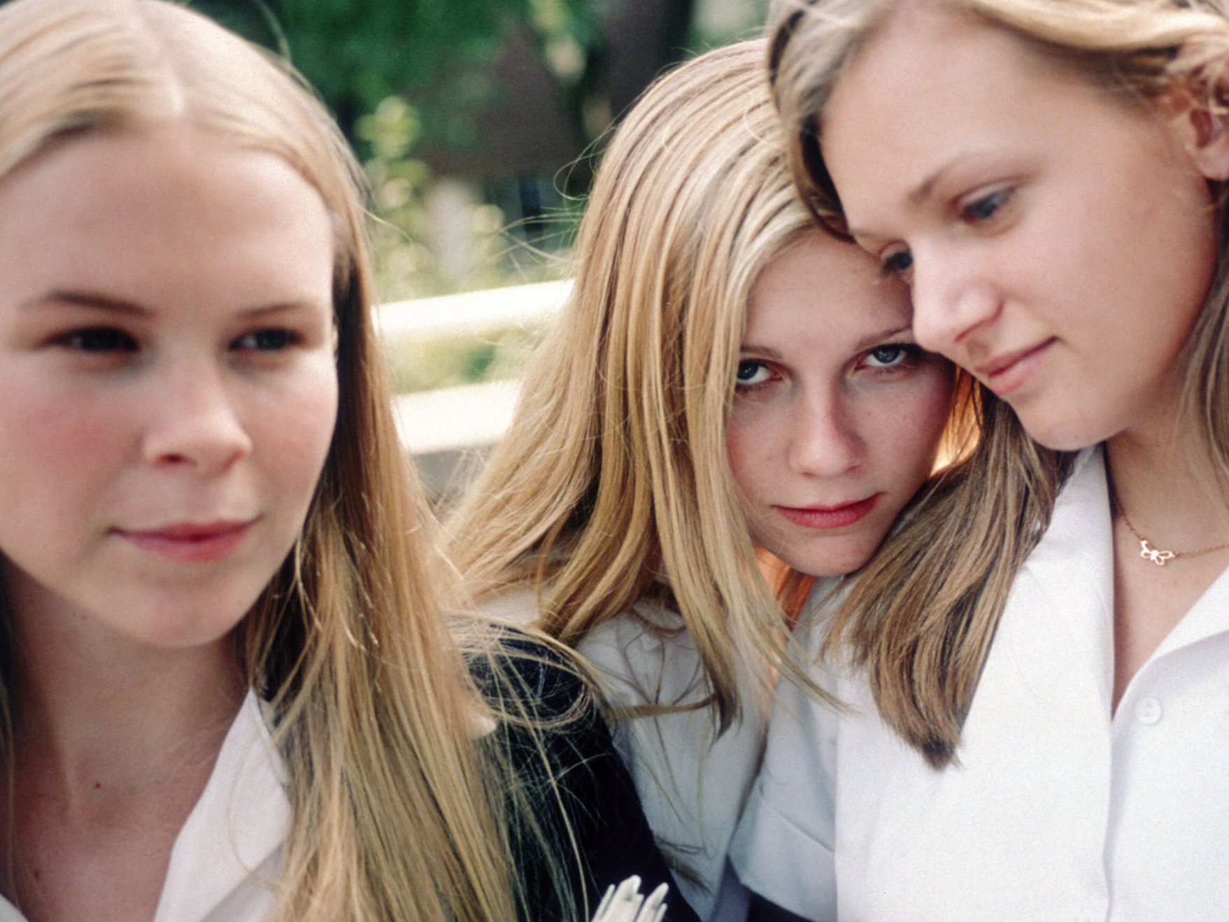 caption: Leslie Hayman, Kirsten Dunst, A.J. Cook and Chelse Swain as the enigmatic Lisbon sisters in Sofia Coppola's <em>The Virgin Suicides</em>.